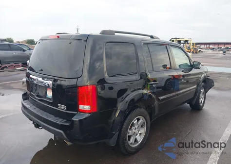 2011 Honda Pilot Touring z USA, uszkodzony, nr VIN 5FNYF4H94BB089913
